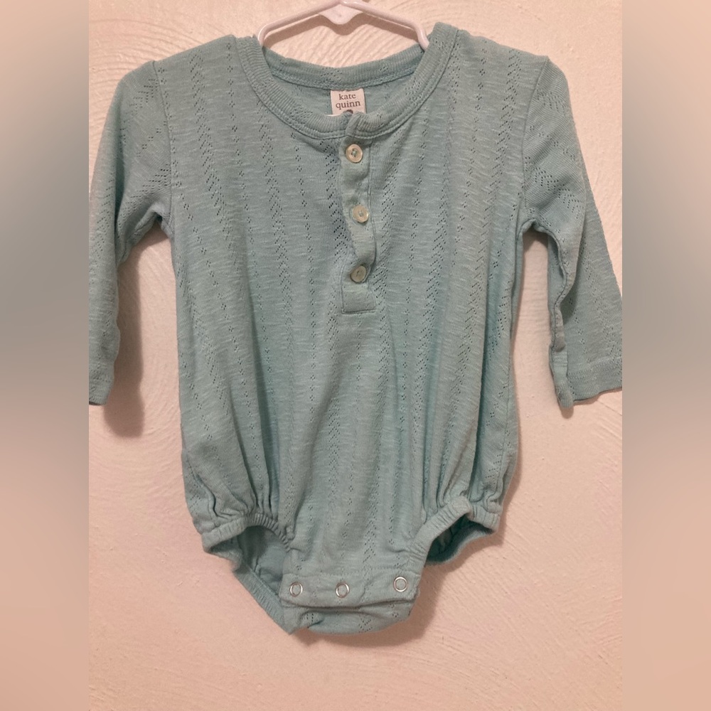 Kate Quinn Onesie